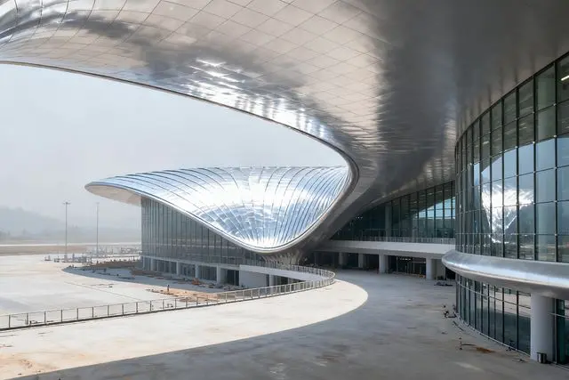 Aeroporto de Zhuhai ganha segundo terminal com design de concha prateada