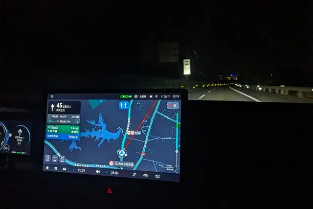 An interior shot of a GAC Aion vehicle showing the navigation system in Guangdong highway S32 after the Zhuhai Airport Expressway